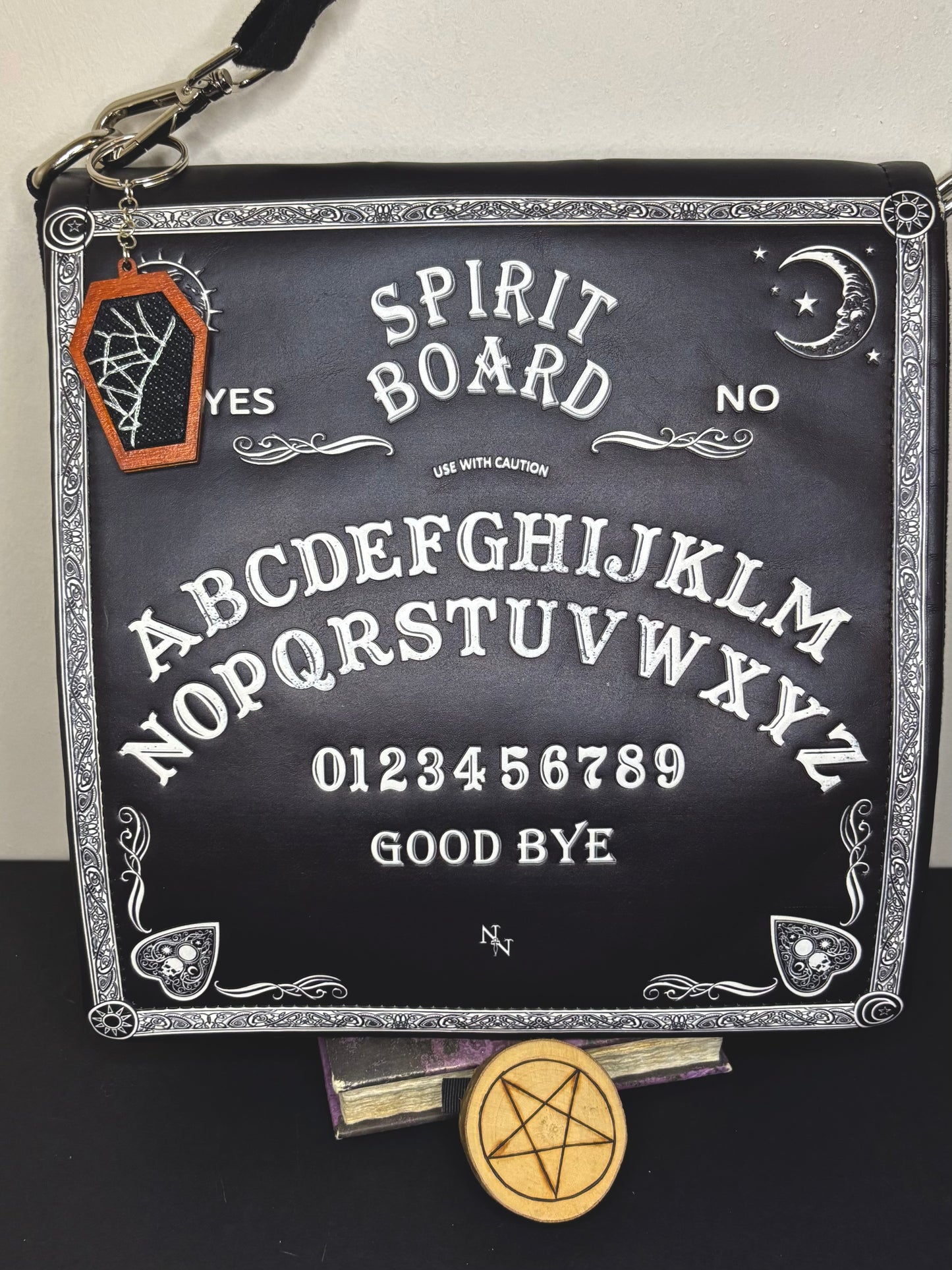 Spiderweb coffin keychain