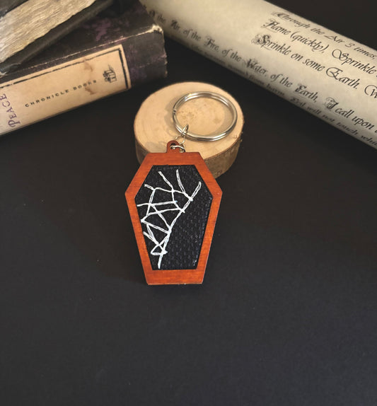 Spiderweb coffin keychain