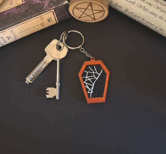 Spiderweb coffin keychain